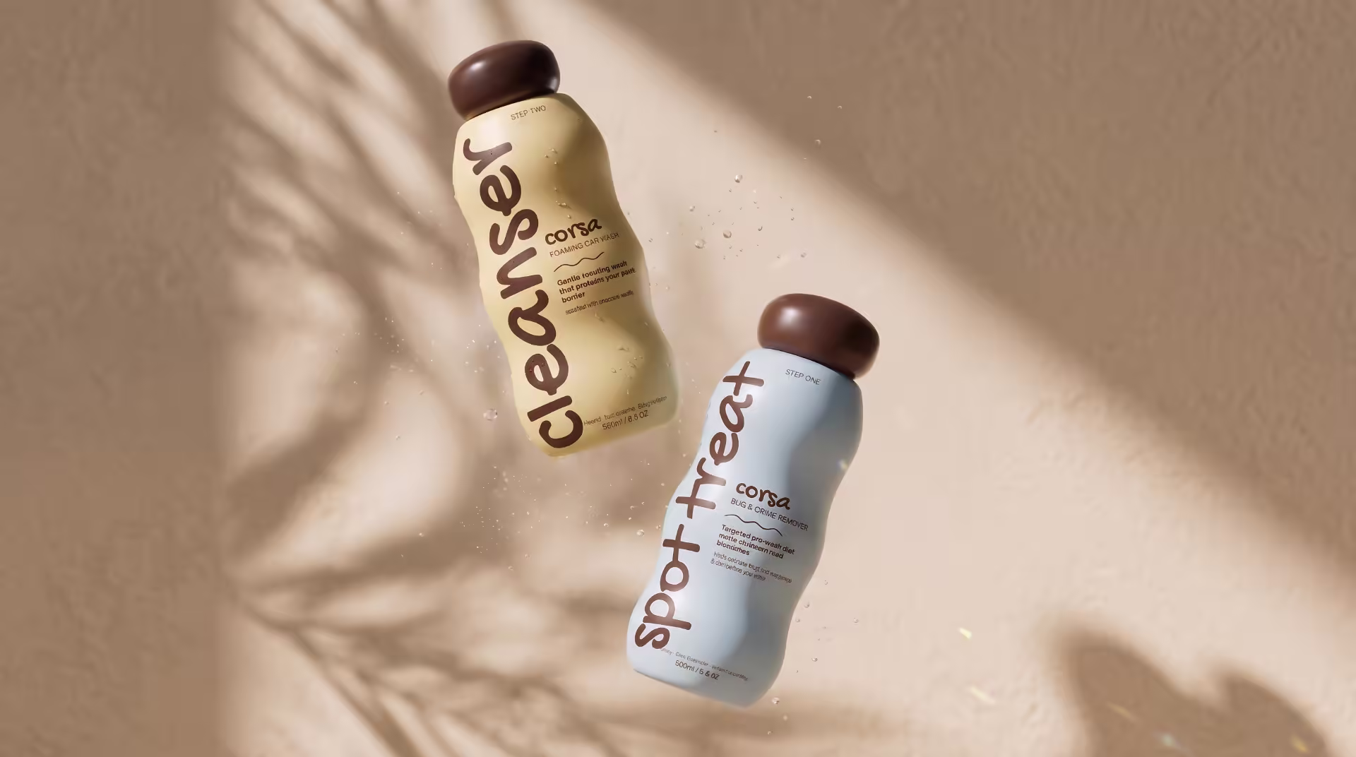 Corsa cleanser and spot treatment bottles suspended in warm light.